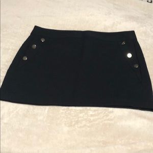 Navy blue skirt with lining & sliver buttons.